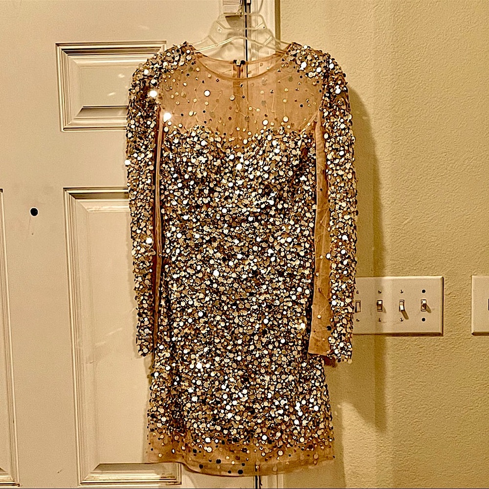 This dress is a size 6. If you wear a size 29 30 in jeans you’ll fit perfect